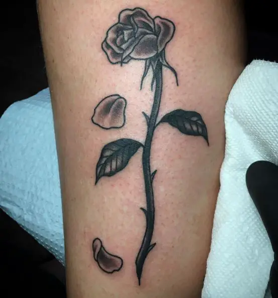 Falling Petals from Dead Rose with Thorns Tattoo
