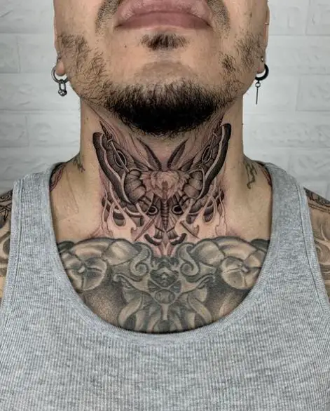 Black and Grey Moth Throat Tattoo
