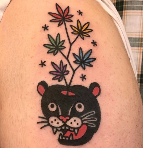 Traditional Panther and Weed Plants Arm Tattoo