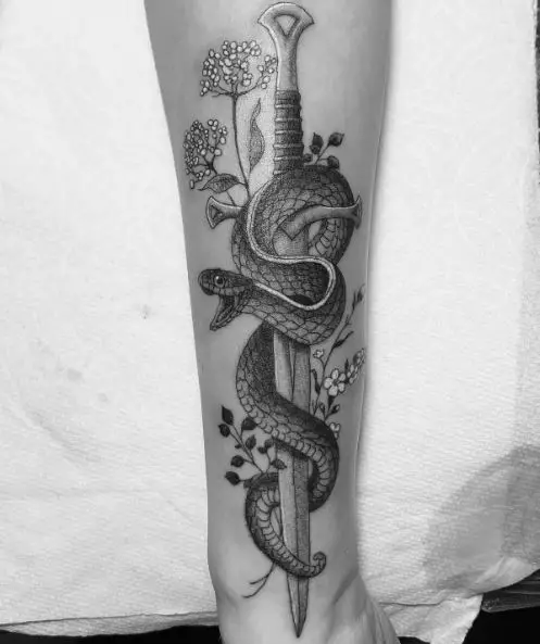Black and Grey Snake and Dagger with Flowers Forearm Tattoo
