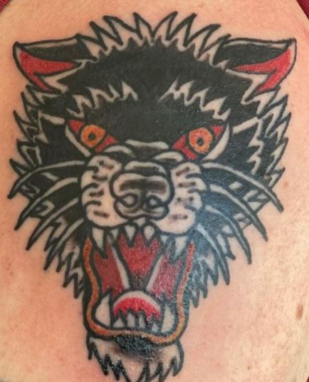 Angry Black Wolf Arm Tattoo