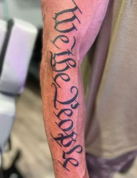 Authentic Font We the People Arm Tattoo