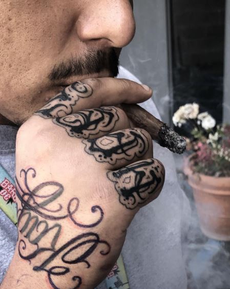 Black Bold Letters Knuckles Tattoo