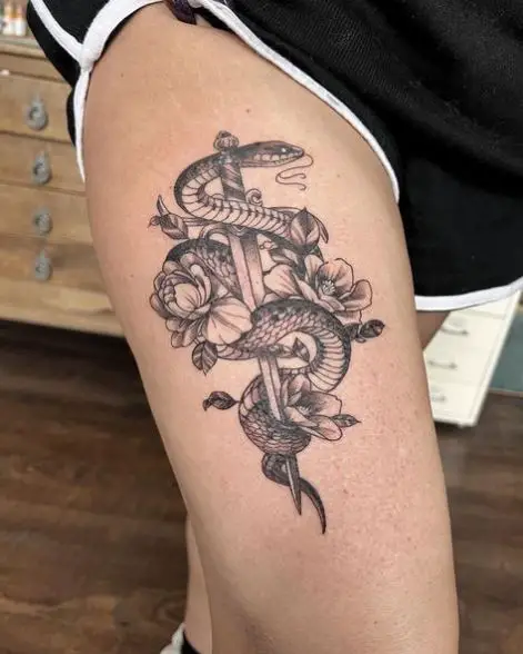 Black and Grey Snake and Dagger with Flowers Thigh Tattoo