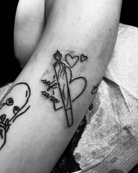 Hearts and Joint Biceps Tattoo