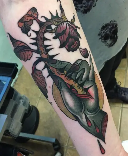 Hand and Dead Rose with Thorns Forearm Tattoo