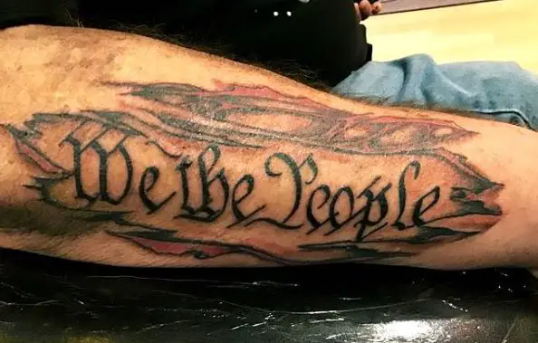 Carved We the People Forearm Tattoo