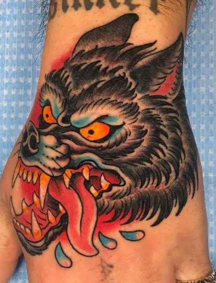 Angry Black Wolf Hand Tattoo