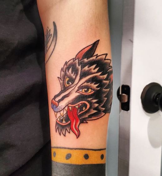 Colored Traditional Wolf Forearm Tattoo