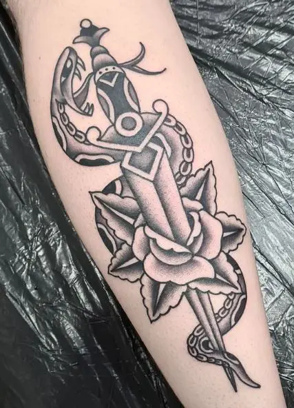 Black and Grey Snake and Dagger with Flower Forearm Tattoo