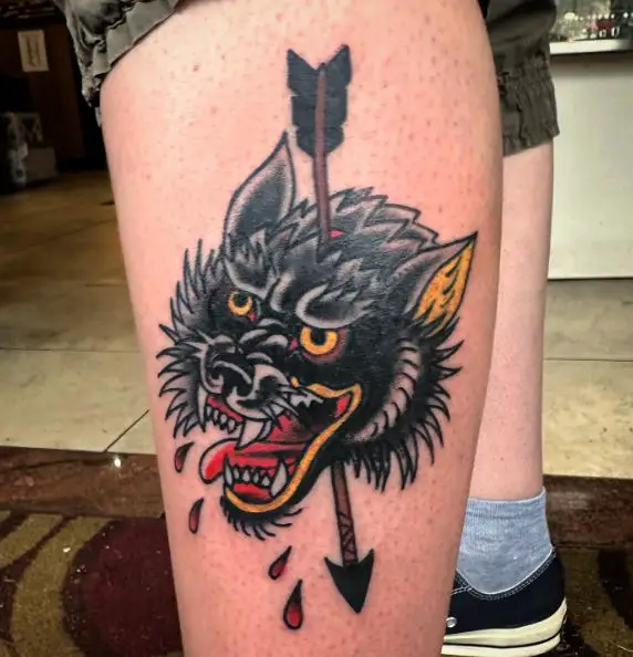 Arrow in Wolf Head Leg Tattoo