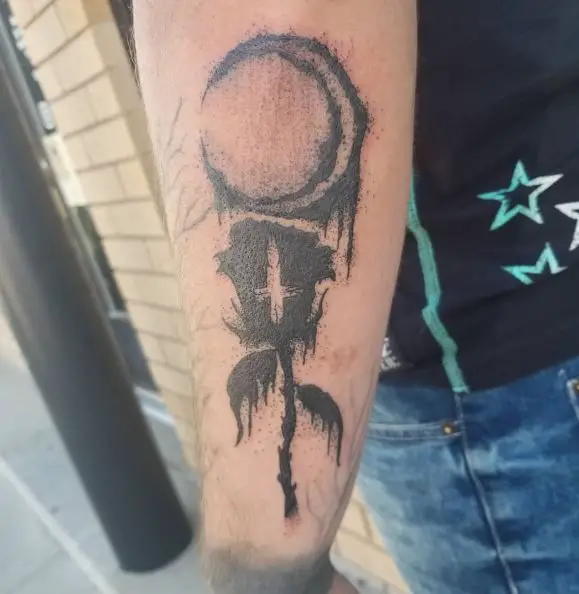 Black Half Moon and Dead Rose Forearm Tattoo