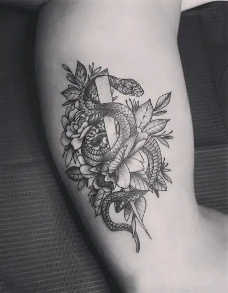 Black and Grey Snake and Dagger with Flowers Biceps Tattoo