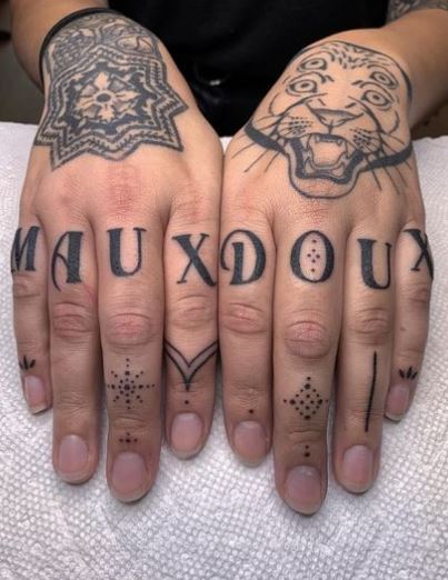 Ornaments and Letters Knuckles Tattoo