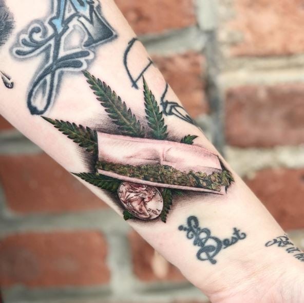 Colored Marijuana Leaf and Joint Forearm Tattoo