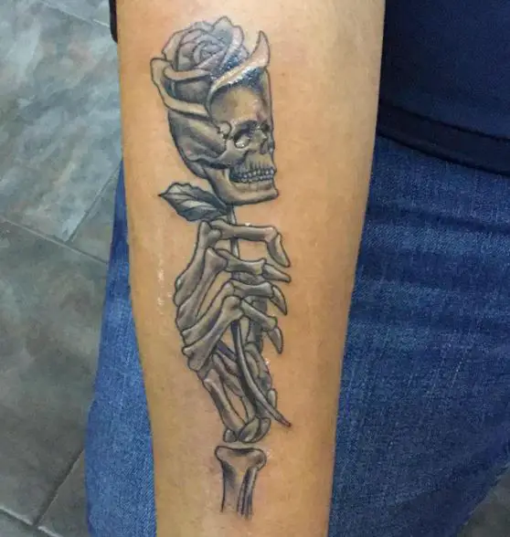 Skeleton and Dead Rose Forearm Tattoo