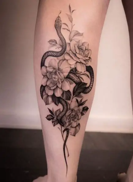 Black and Grey Snake and Dagger with Flowers Calf Tattoo