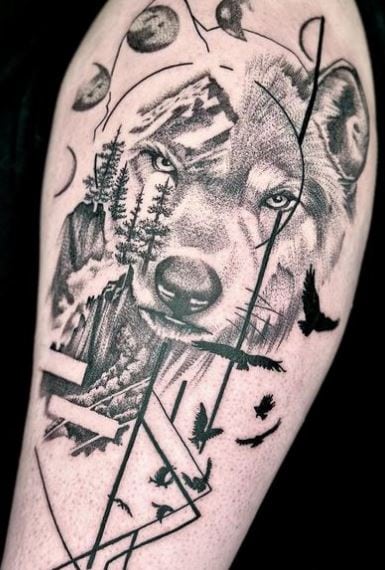 Landscape with Birds and Wolf Head Arm Tattoo