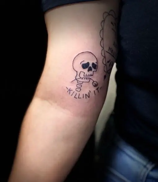 Skull and Dead Rose Biceps Tattoo