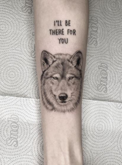 Wolf Head with Message Forearm Tattoo