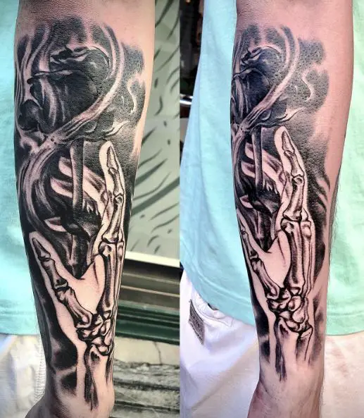 Hand and Dead Rose Forearm Tattoo