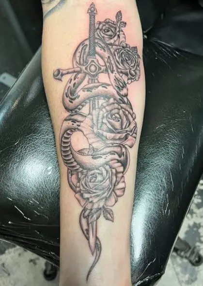 Grey Snake and Dagger with Roses Forearm Tattoo