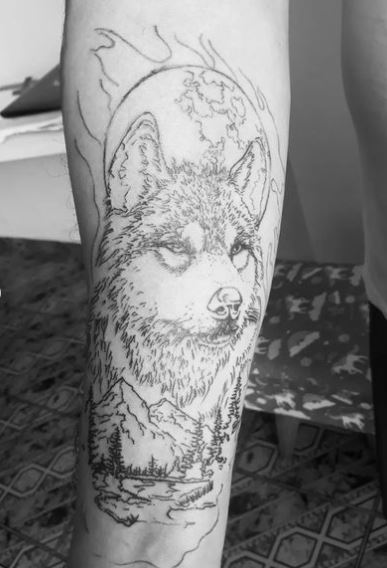Mountain Landscape and Wolf Head Arm Tattoo