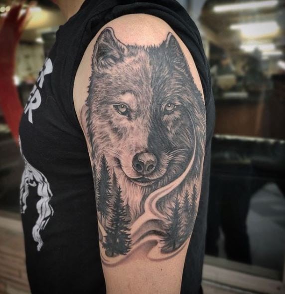 Black and Grey Landscape and Wolf Head Arm Tattoo
