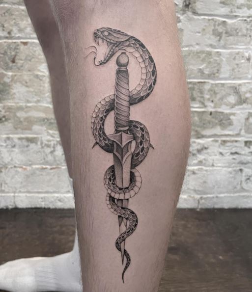 Grey Snake and Dagger Calf Tattoo
