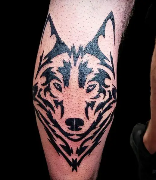 Black Wolf Head Leg Tattoo