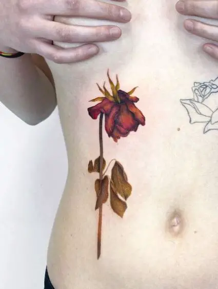 Dead Red Rose with Leaves Ribs Tattoo