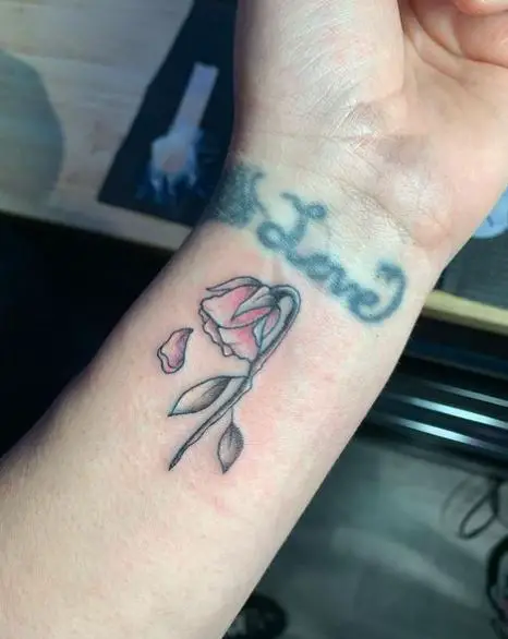 Falling Petal and Dead Red Rose Wrist Tattoo