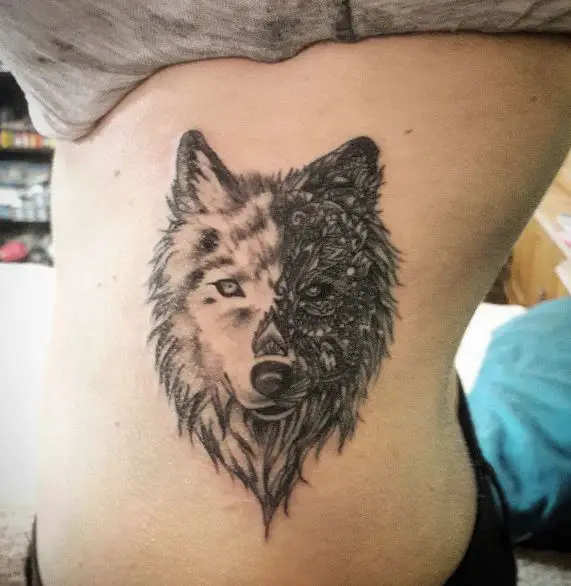 Two Faced Wolf Head Ribs Tattoo