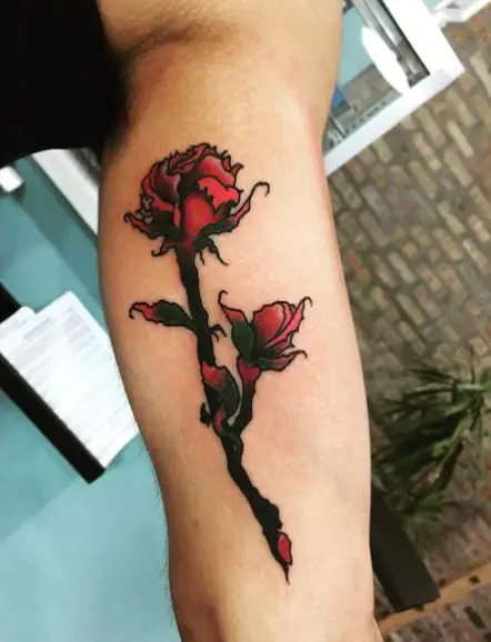 Dying Red Roses Biceps Tattoo