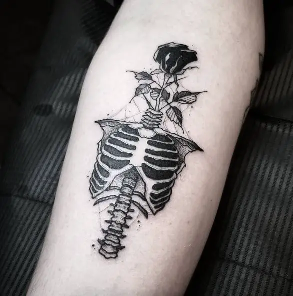 Skeleton and Dead Rose Arm Tattoo