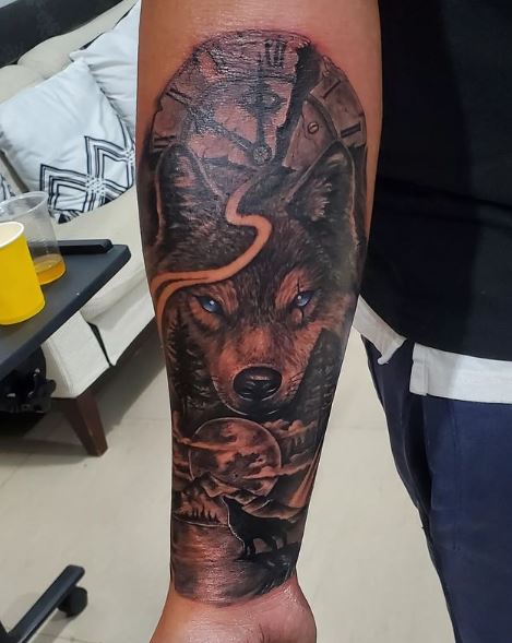 Night Landscape and Wolf with Blue Eyes Arm Tattoo