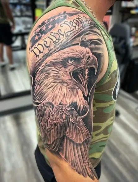 Black and Grey Eagle and We The People Arm Tattoo