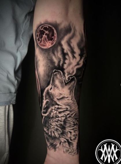 Full Moon and Howling Wolf Arm Tattoo