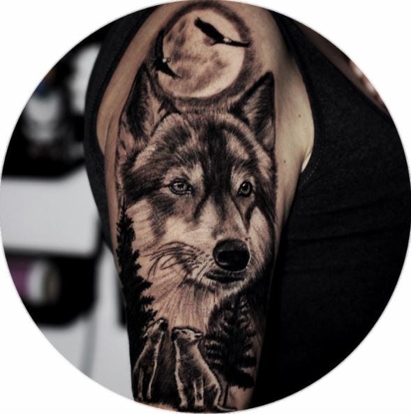 Full Moon and Birds with Wolves Arm Tattoo