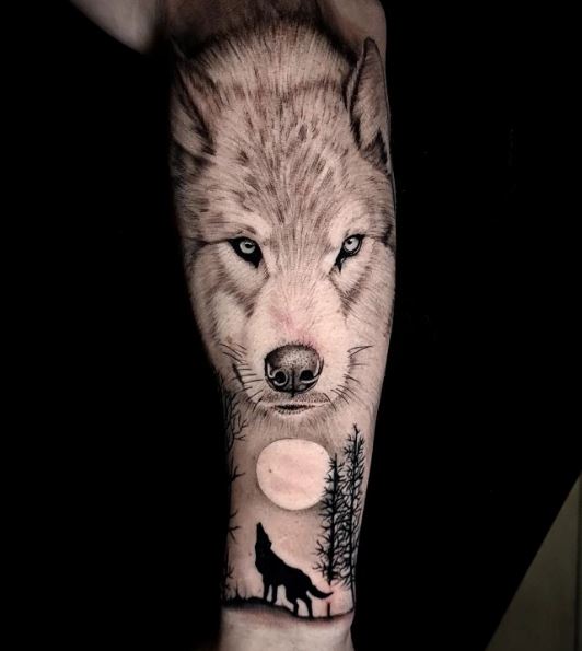 Wolf Head and Howling Wolf Arm Tattoo