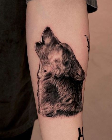 Black and Grey Howling Wolf Arm Tattoo