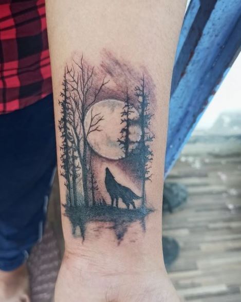 Full Moon and Howling Wolf Forearm Tattoo