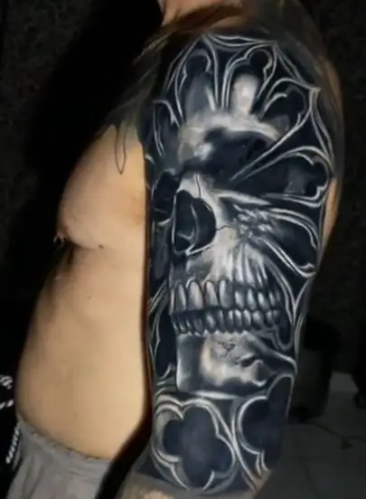 Black and Grey Skull Arm Sleeve Tattoo