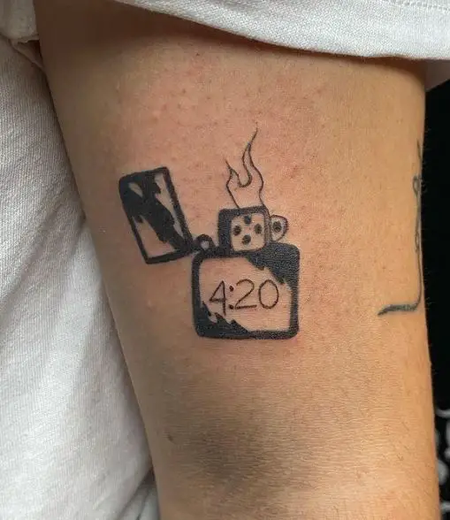 Zippo Lighter and 4:20 Biceps Tattoo