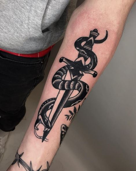Black and Grey Snake and Dagger with Leaves Forearm Tattoo