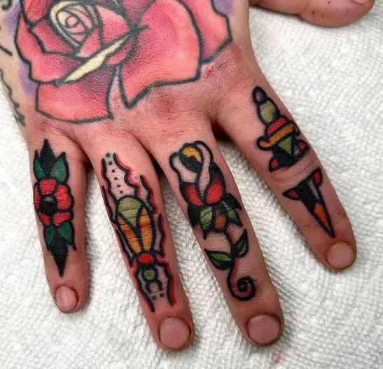 Flowers with Bug and Dagger Knuckles Tattoo