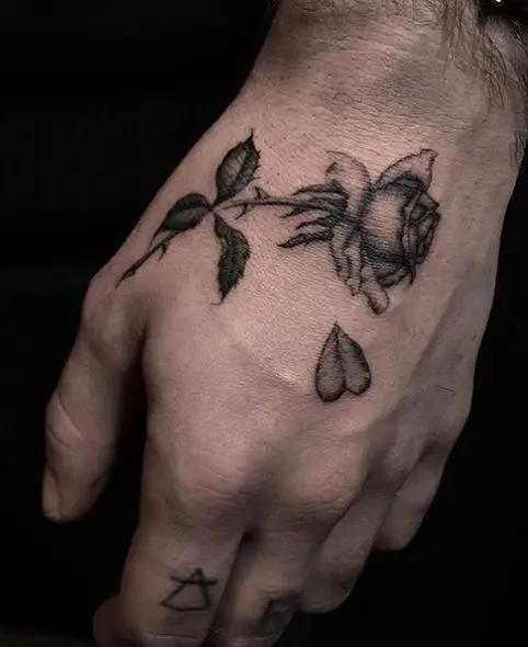 Dead Rose with Falling Petals Hand Tattoo