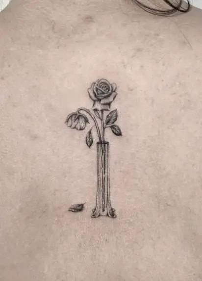Dead Roses in a Vase Spine Tattoo