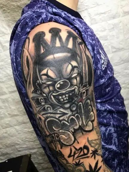 Smiling Clown and 420 Arm Tattoo