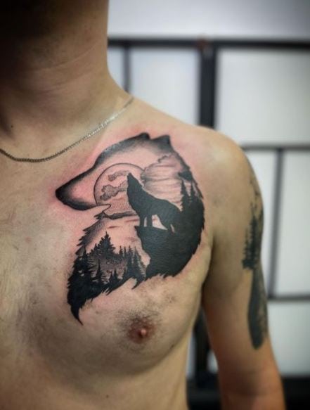 Mountain and Howling Wolf Chest Tattoo